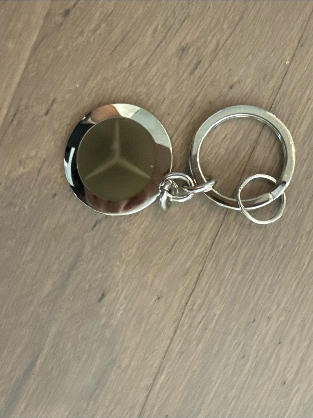 Authentic Mercedes Silver Round Keychain with Circular Accent